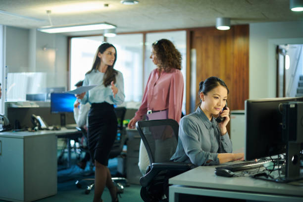Inclusive team circle discussion in an open-plan office zone